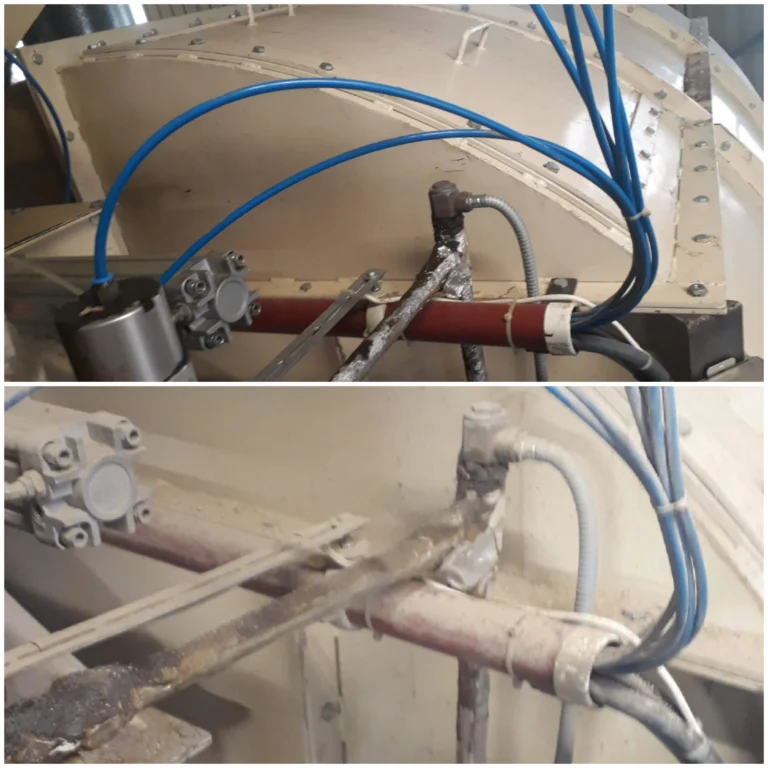 Pneumatische cilinders en leidingen in een productiemachine